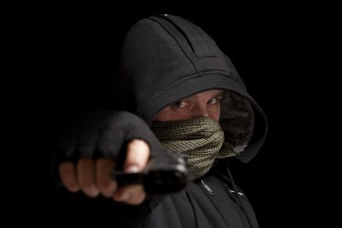 мужчина с пистолетом, фото из открытых источников