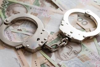 коррупция деньги наручники гривна