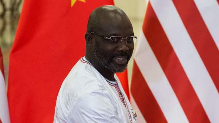 Либерии Джордж Веа