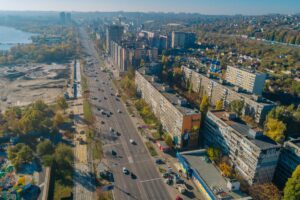 город