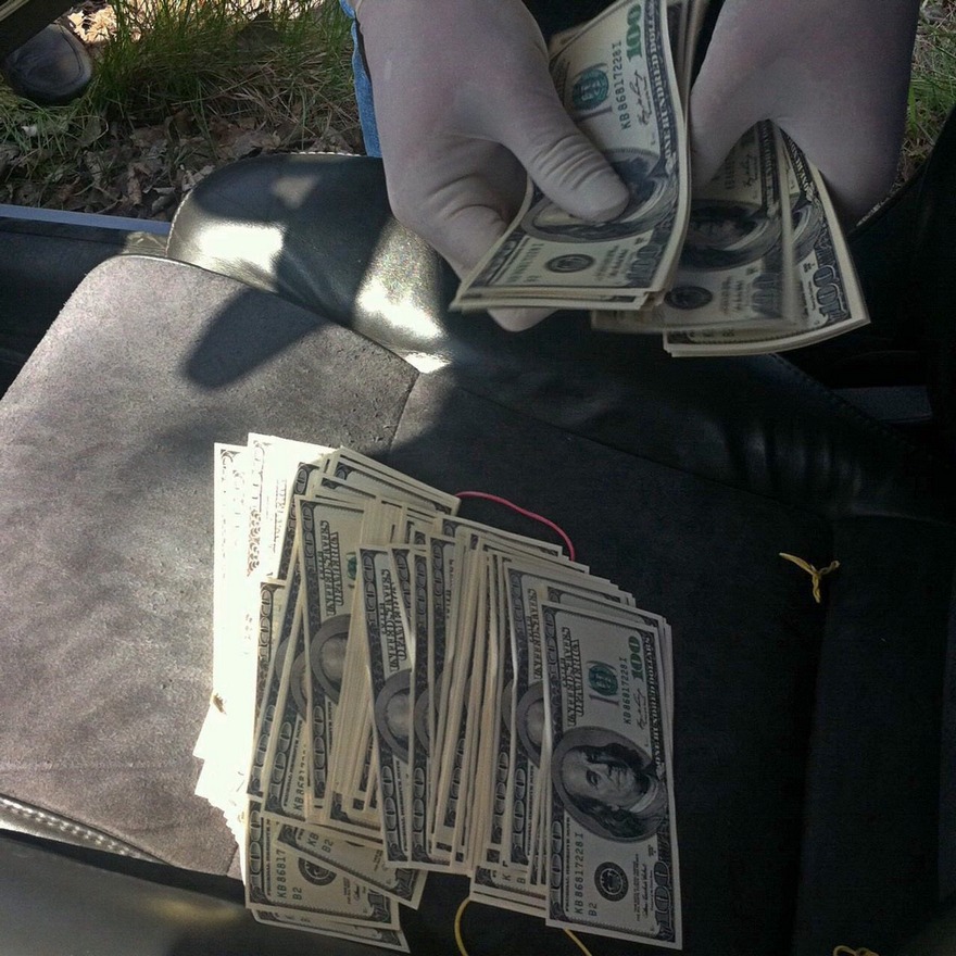 поймать на взятке