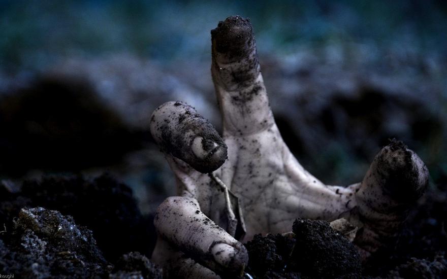 zombie-hand-rising-from-grave-wallpaper-532a71df170eb