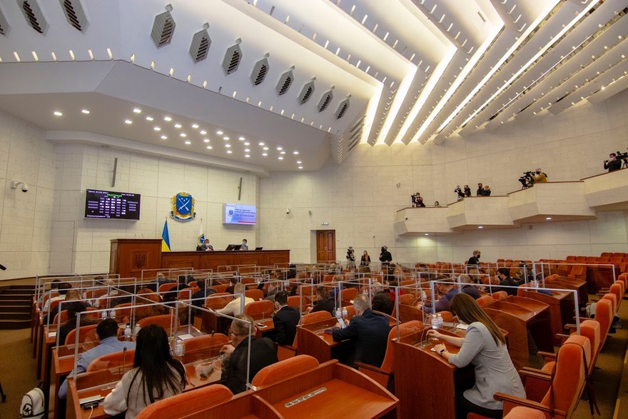 город