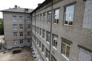 город