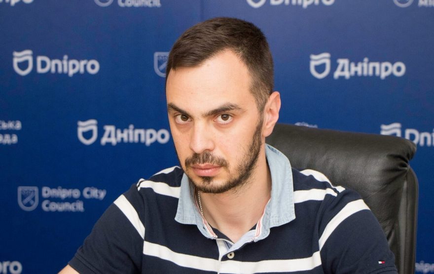 город